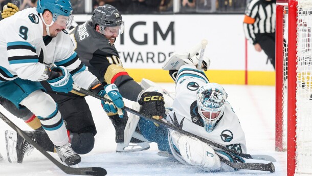 Vegas Golden Knights center Colton Sissons (10) scores a goal against San Jose Sharks defenseman Dmitry Orlov (9) and goaltender Alex Nedeljkovic (33) during the second period of an NHL hockey game Saturday, Nov. 29, 2025, in Las Vegas. (AP Photo/Ian Maule)
