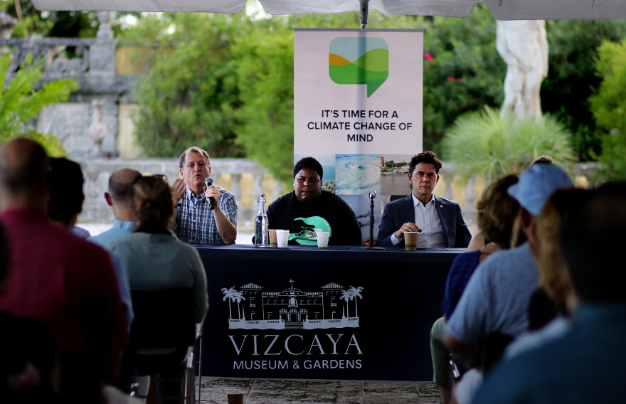 Ben Kirtman, left, director of the Climate and Environmental Hazards Program at the University of Miami, Valencia Gunder, center, a community activist, and Ken Russell, right, a City of Miami Commissioner, talk about Climate Gentrification. 