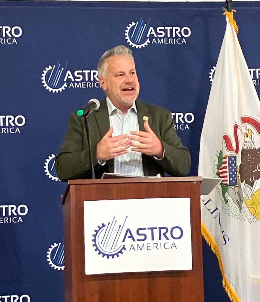 Congressman Eric Sorensen speaking at Thursday's press conference at ASTRO America, Moline.