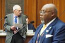 Rep. Jeff Thompson, R-Lizton, listens as Rep. Greg Porter, D-Indianapolis, speaks during a meeting in the Indiana House chambers