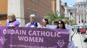 Representatives of the U.S.-based Women's Ordination Conference protest in front of St. Peter's Basilica at the Vatican. The group's executive director said the Vatican has turned a blind eye to male priests who "destroy the lives of children and families, but jumps at the chance to excommunicate women."