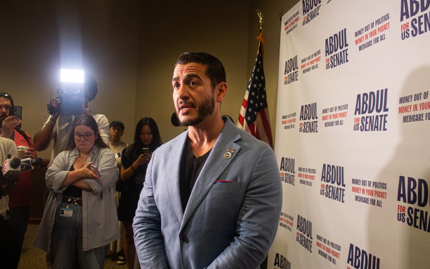 U.S. Senate candidate Abdul El-Sayed takes questions from members of the press following his campaign rally at the Lansing Convention Center on July 19, 2026.