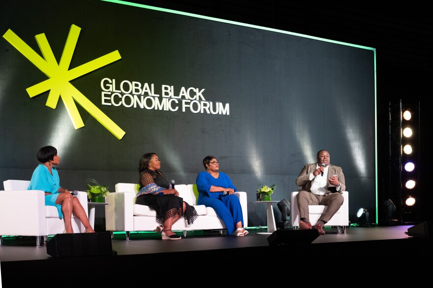 At right, Damon Hewitt, president and executive director of the Lawyers' Committee for Civil Rights, speaks during the Global Black Economic Forum panel "How Black-Led Institutions and Leaders Are Building and Sustaining the Infrastructure That Shapes American Democracy" at Essence Fest on July 4, 2026, in New Orleans, La.