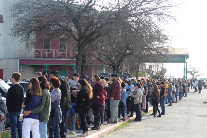 Hundreds line up for Sanders' rally at Cowboys Dancehall in San Antonio on Saturday.