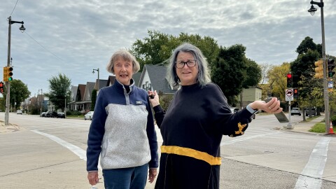 Rita Herman and her daughter Amy Carlson looking for missing street signs
