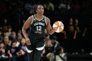 Las Vegas Aces guard Chelsea Gray (12) plays against the Golden State Valkyries in a WNBA basketball game Sunday, June 21, 2026, in Las Vegas. (AP Photo/John Locher)
