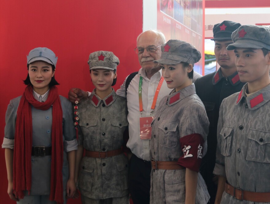 Mao soldier reenactors at conference in Xi-an, China 2018 with correspondent Tom Wilmer (center)