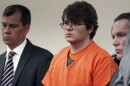 FILE - Payton Gendron, center, listens as he is sentenced, Feb 15, 2023, in Buffalo, N.Y.