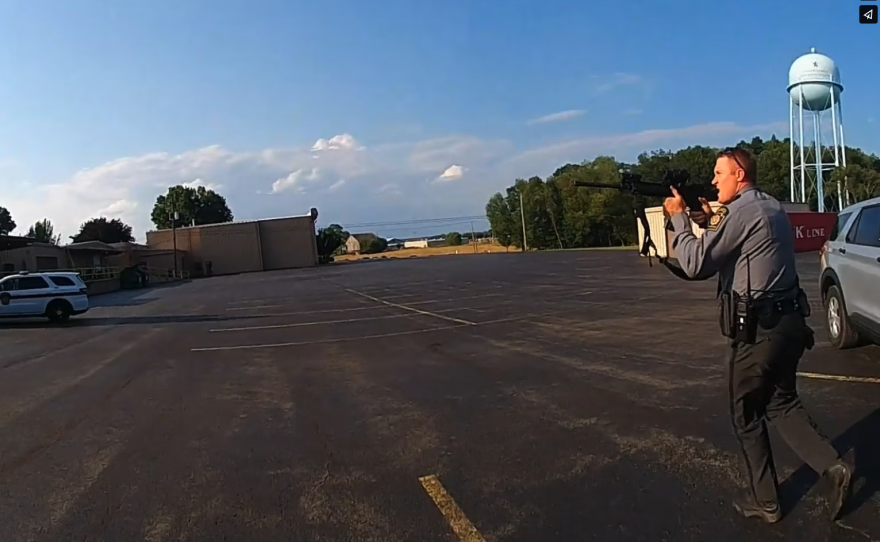 FILE - Local Pennsylvania police officers scramble after shots were fired at the July Trump rally in Butler. 