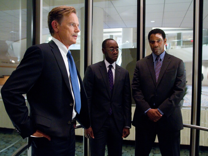 Charlie Anderson (Bruce Greenwood) and Hugh Lang (Don Cheadle) help Whip navigate treacherous legal waters.