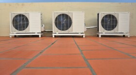 Air conditioners on a building. Scientists say there has been too little research into the role of heating, ventilation and air conditioning systems in the spread of the coronavirus.