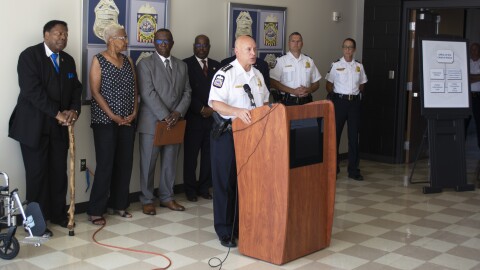 Police Chief Tom Quinlan announces the division's reorganization.