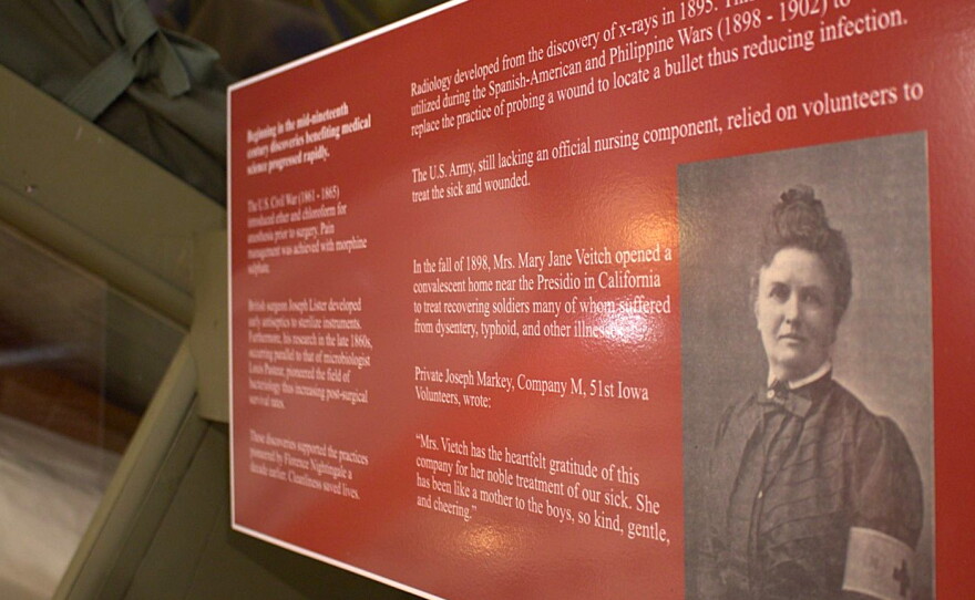 A display that shows the picture and story of an Iowa military nurse.