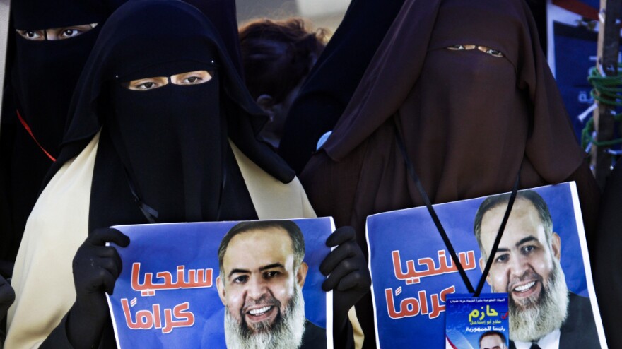 During a demonstration at Cairo's Tahrir Square last week, veiled Egyptian women hold posters supporting Muslim cleric Hazem Abu Ismail, an ultra-conservative preacher who was disqualified from running for the presidential elections on technical grounds.
