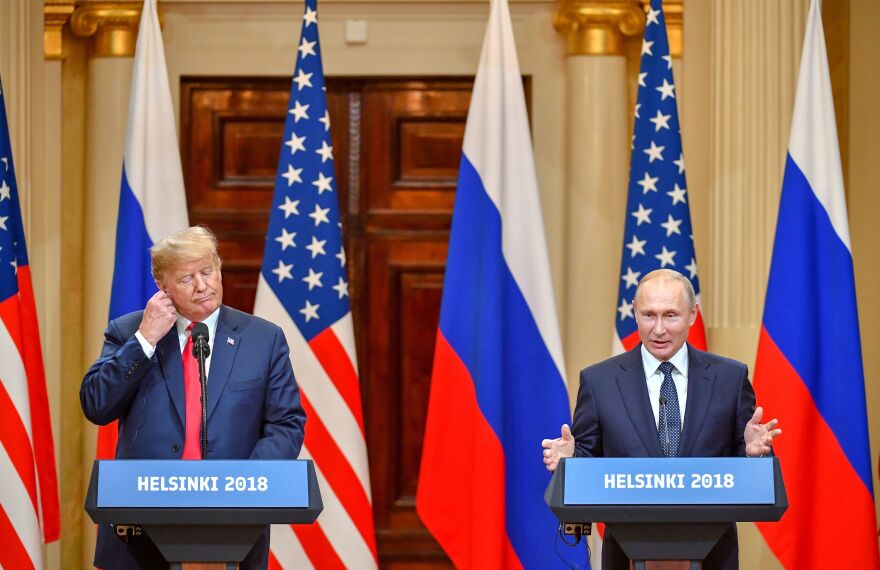 Presidents Trump and Vladimir Putin hold a joint news conference after a meeting at the Presidential Palace in Helsinki on Monday.