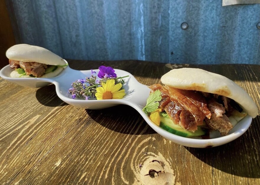 Bao Buns, Potstickers and Egg Rolls are offered at Jesse Pepper’s Smoke Shack under appetizers. The Bao Buns stuffed with smoked pork were inspired by the dishes they are served on.