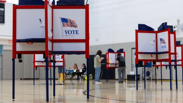 Voters cast their ballots for the August 4 primary election inside of Saginaw United high school.