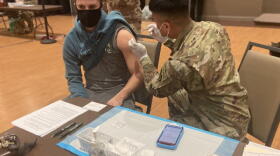 Extra doses of the Johnson & Johnson COVID-19 vaccine will go to students at Illinois State University and Illinois Wesleyan University, according to the McLean County Health Department. A mobile National Guard unit is helping ISU's on-site vaccinations.