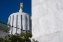 The Oregon Pioneer statue sits atop the Oregon State Capitol in Salem, Ore., on Sept. 8, 2026.
