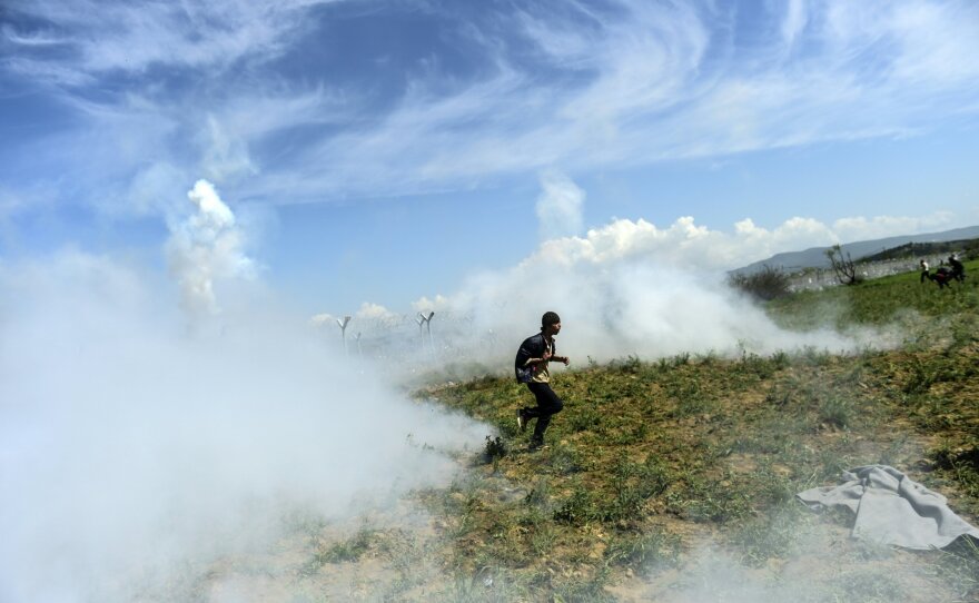 On Sunday, refugees and migrants attempted to storm the border fence between Greece and Macedonia. They were met with tear gas, stun grenades, rubber bullets and water cannons.