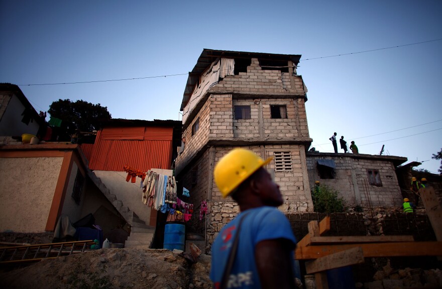 This flimsy three-story house, which was rebuilt after the earthquake in January 2010, will have to be demolished to make way for an 18-unit housing project. Many homes that were rebuilt after the quake are even more dangerous than the original ones.