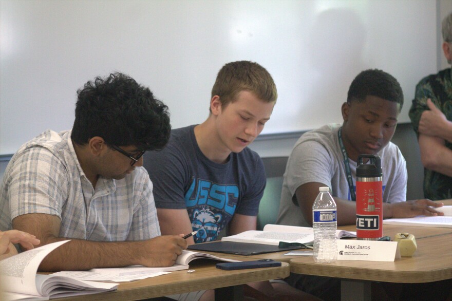 High school student Max Joros speaks during a classroom lecture on Capitalism during the Civics Education Academy, hosted by Michigan State University's James Madison College on July 15, 2026.