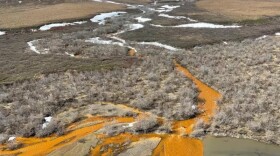 The orange tributary of the Kugororuk River in Alaska is an example of a "rusting river." These rivers are increasingly common in the Brooks Range of northern Alaska, the result of thawing permafrost. The orange color is caused by naturally occurring iron, but it can also indicate elevated levels of heavy metals.