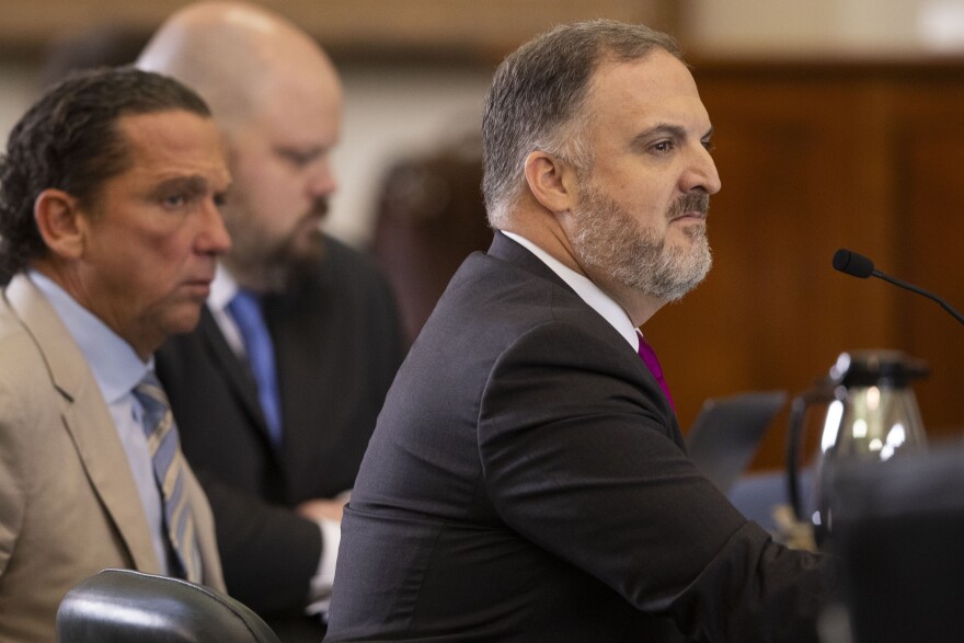 (From left) Defense attorneys Tony Buzbee and Mitch Little listen to witness testimony during day 5 of Texas Attorney General Ken Paxton’s impeachment trial in the Senate chamber at the Texas State Capitol in Austin on Monday, Sept. 11, 2023. <br/>