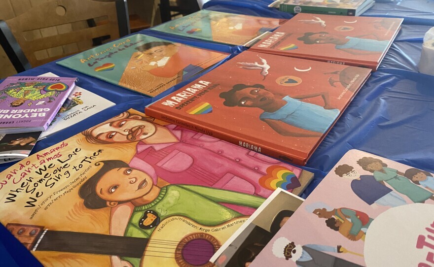 Bilingual children's books donated by the Rocky Mountain branch of Gay for Good were given out at the event at the Bluebird Cafe in Glenwood Springs on April 15.