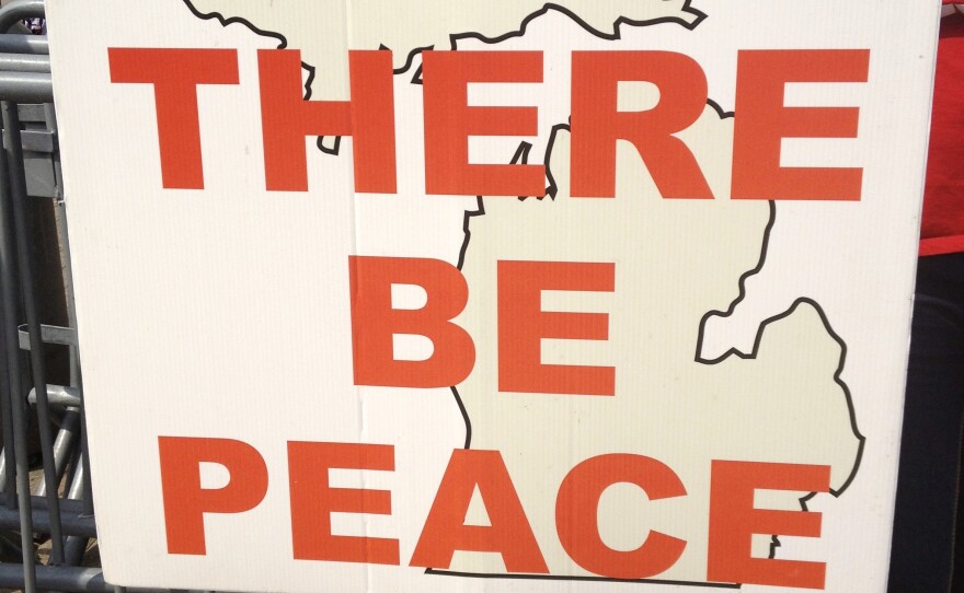 A sign at the Martin Luther King anniversary march on June 22 reads "let there be peace."