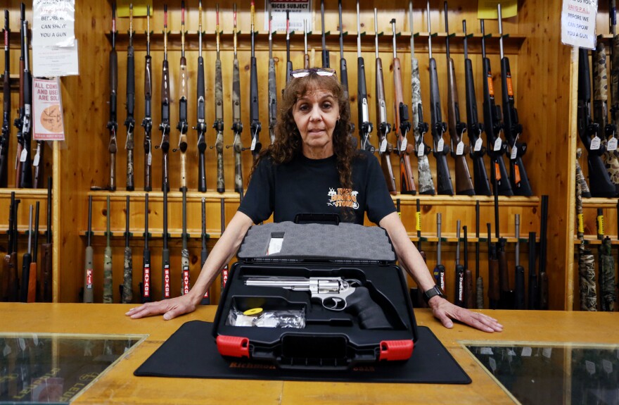 Jen Lavigne, co-owner of That Hunting Store, with a Ruger GP100, on June 3, in Ottawa, Canada. Canadians rushed to buy handguns after Prime Minister Justin Trudeau announced on May 30 a proposed freeze on sales in the wake of recent mass shootings in the U.S. "Sales have been brisk," said Lavigne.