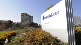 FILE - A sign stands on UnitedHealth Group Inc.'s campus in Minnetonka, Minn., on Oct. 16, 2012. UnitedHealth Group said Monday, Oct. 3, 2022, that it completed its acquisition of Change Healthcare, closing the roughly $8 billion deal a couple weeks after a judge rejected a challenge from federal regulators. (AP Photo/Jim Mone, File)