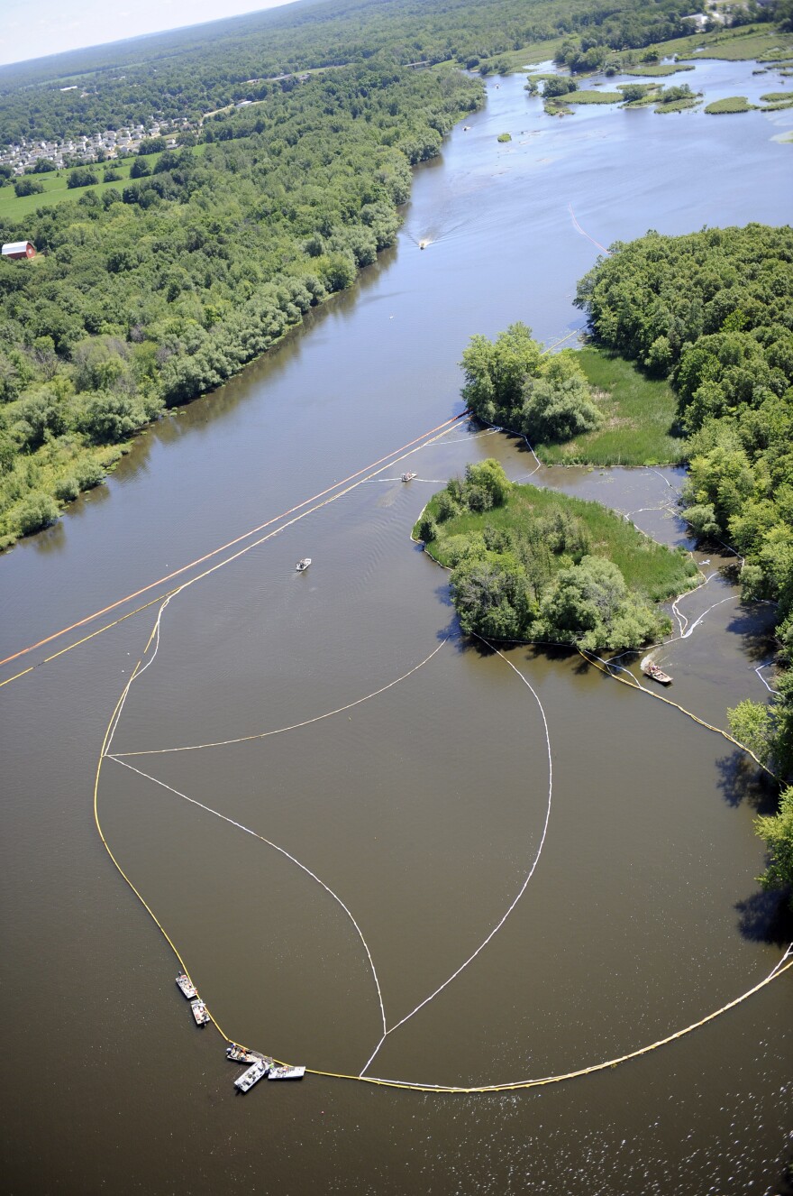 Cleanup work continues on the Kalamzoo River almost a year after the oil spill.