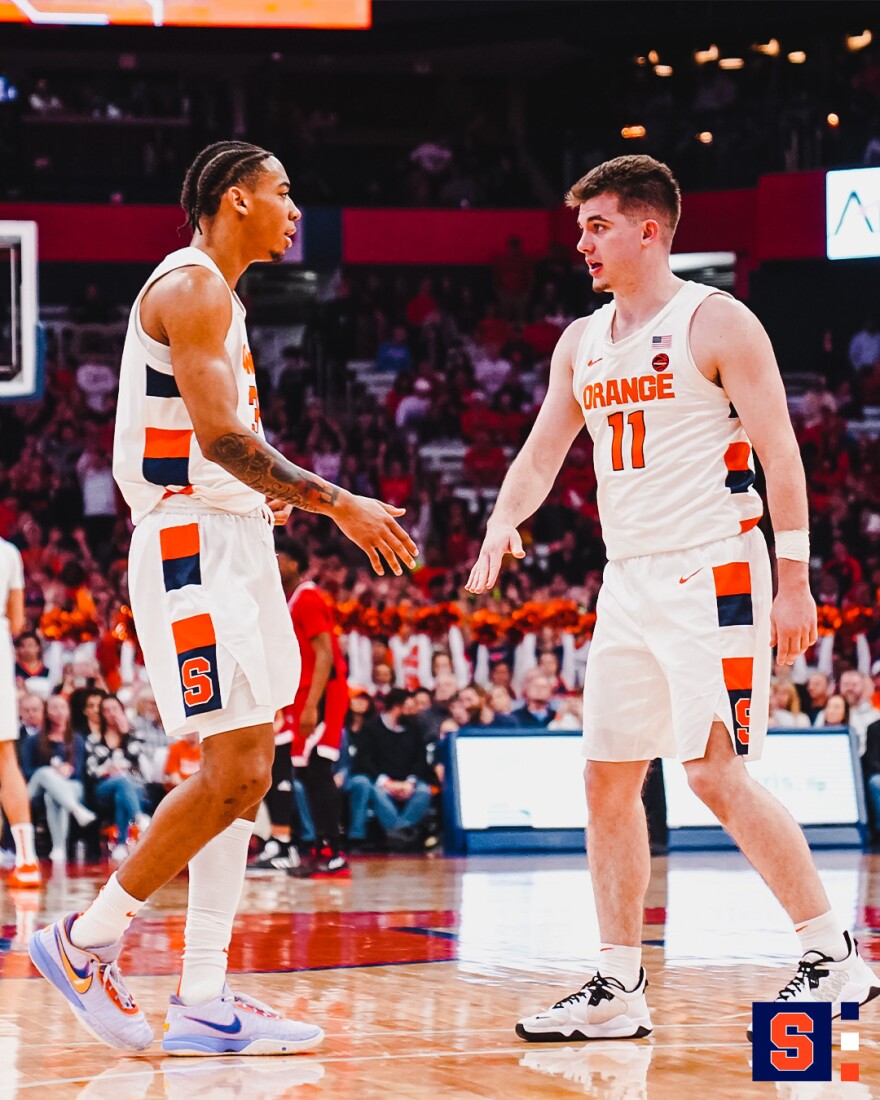 Judah Mintz (3) and Joe Girard (11) communicate during SU's 75-72 win over No. 23 NC State.