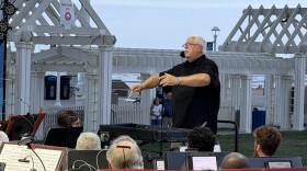 John Brewington conducting the Tidewater Winds Concert Band last month during a free concert at the Oceanfront. Brewington is the inaugural Champion for the Arts Educator for the city