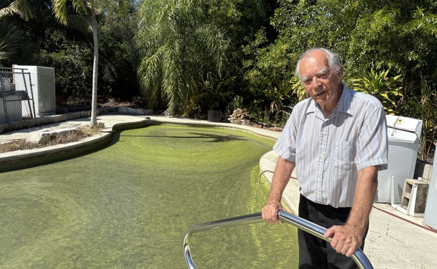 Army veteran John Bohanek stands next to what once was his swimming pool before Hurricane Ian destroyed his home.
