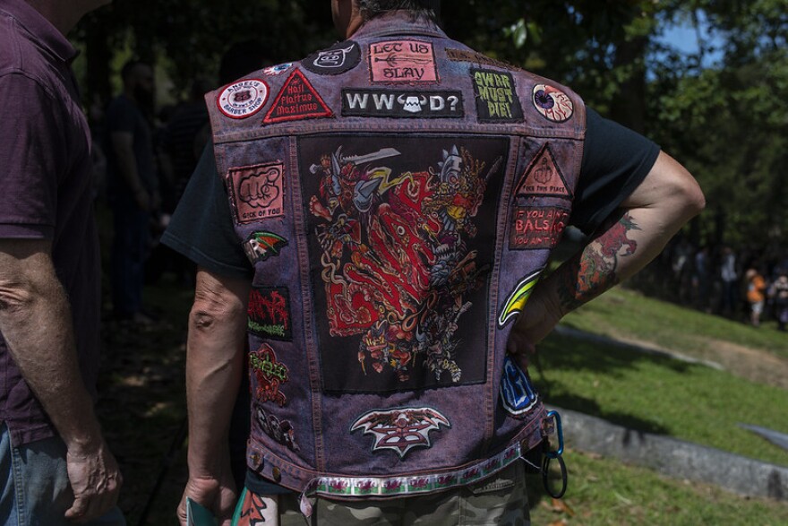 A GWAR fan at the memorial to GWAR co-founder and lead singer Dave Brockie - Hollywood Cemetery in Richmond, Virginia on 8/30/19.