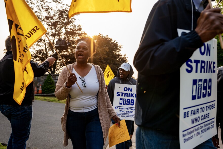 Members of SEIU 1199NE march in front of Oak Hill in Hartford as they launch an indefinite strike to demand wage increases. 17,000+ members of SEIU 1199 New England launch an indefinite strike at group homes and day program facilities across Connecticut. The state funded workers currently start at $17 an hour, a wage that they blame for chronic staffing problems in the industry.