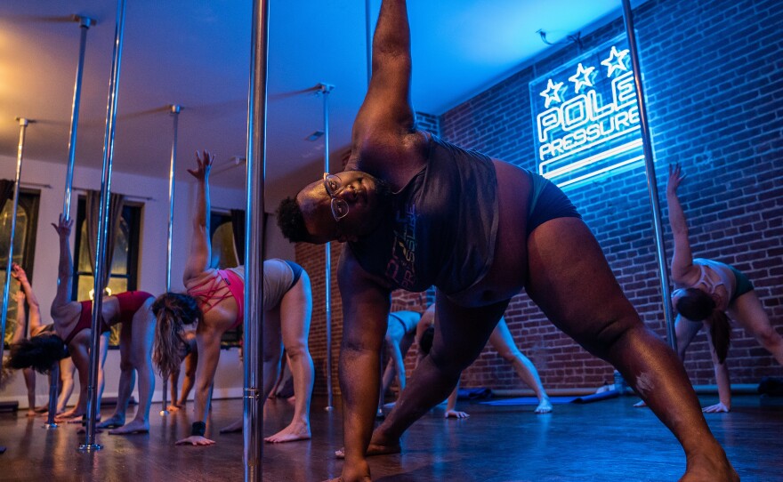 Pole dancing classes can consist of ground work, aerial hoop, pole inversions or acroyoga.