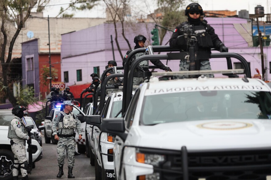 National Guards patrol the area outside of the General Prosecutor's headquarters in Mexico City, Sunday, Feb. 22, 2026, after authorities reported that the Mexican Army killed Jalisco New Generation Cartel leader Nemesio Oseguera, known as "El Mencho."