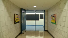 A hallway and billboard remain empty at Yung Wing School P.S. 124 in New York City.