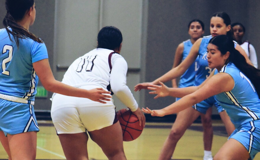 tbh producer Faustina Tangitau playing basketball
