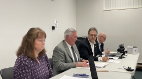 Medina County Budget Commission members discuss the results of an executive session where they reviewed a lawsuit from a local school district attempting to halt an attempt to rollback school taxes.