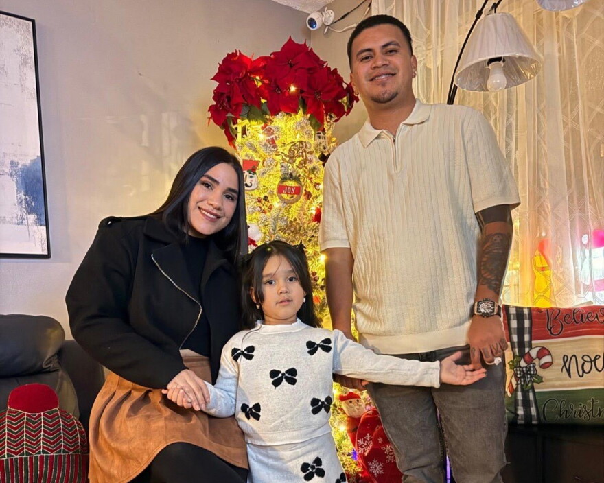 Ydienays Dominguez with her daughter Zoeh and her husband Anderson.