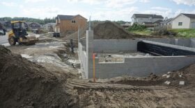 the construction of a new home in a neighborhood