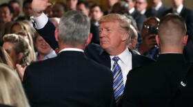 U.S. President Donald Trump waves to the crowd while attending a small businesses event in the East Room at the White House on Aug. 1, 2017 in Washington.
(Mark Wilson/Getty Images)