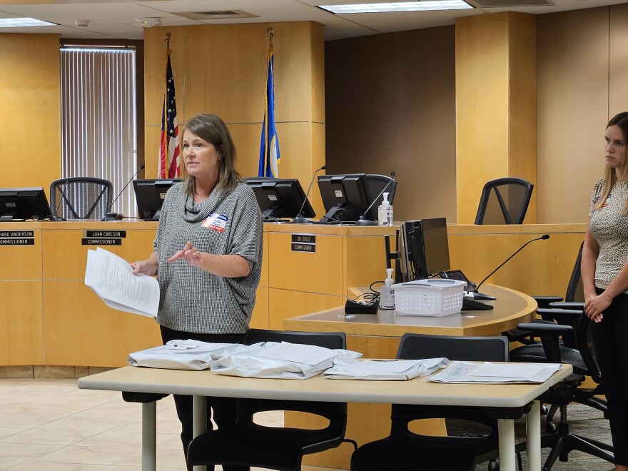 Beltrami County Auditor-Treasurer JoDee Treat explains the recount procedures, indicating the sealed election night ballots, plus three categories of early voting or absentee ballots, on Aug. 28, 2024.
