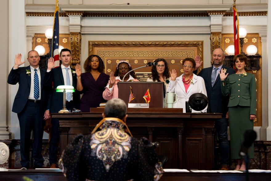The St. Louis Register administers the oath of office to Aldermen (from left): Matt Devoti, of the 5th Ward, Michael Browning, of the 9th Ward, Alisha Sonnier, of the 7th Ward, Laura Keys, of the 11th Ward, Pam Boyd, of the 13th Ward, Shane Cohn, of the 3rd Ward, and Anne Schweitzer, of the 1st Ward, during a ceremonial inauguration on Tuesday, April 15, 2025, at City Hall. Board President Megan Green stands at the center.