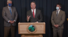 Speaker Todd Huston (R-Fishers) discusses education funding in the new state budget, flanked by Gov. Eric Holcomb, left, and Senate President Pro Tem Rodric Bray (R-Martinsville), right.