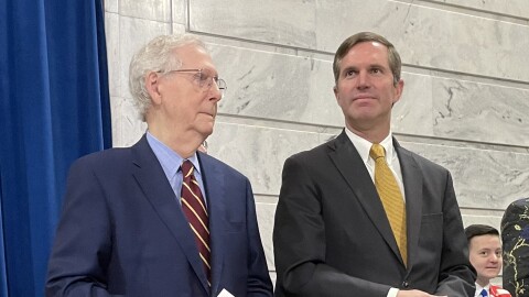 Mitch McConnell and Andy Beshear stand side by side